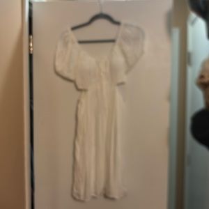 Cream side split dress never worn with tags.